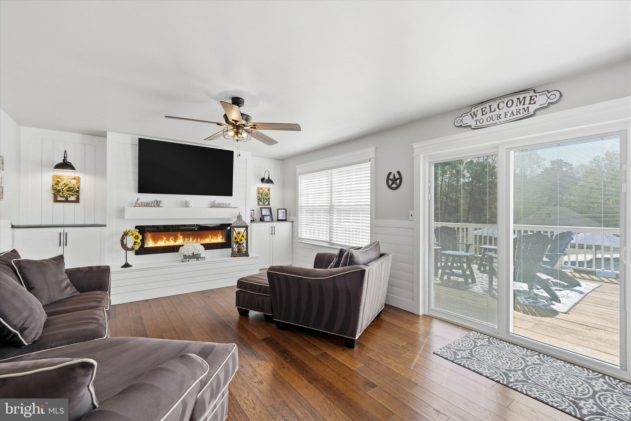 176 Warren Grove Road Barnegat, NJ 08005 - Photo 28 of 71 a living room with furniture and a flat screen tv