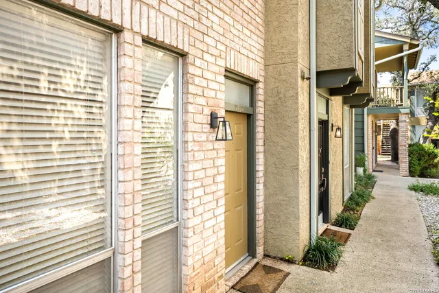 a view of a brick building from a windows