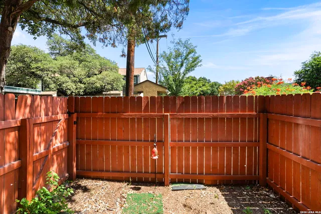 a view of a wooden fence