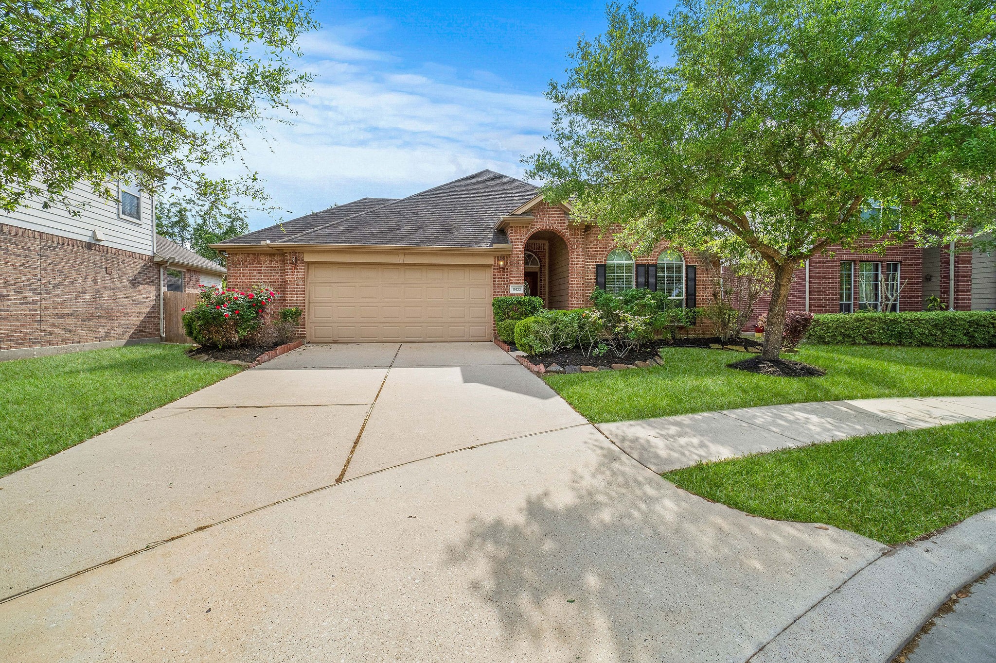 17423 Renee Springs Court Spring, TX 77379 - Photo 1 of 19 a front view of a house with a yard and garage