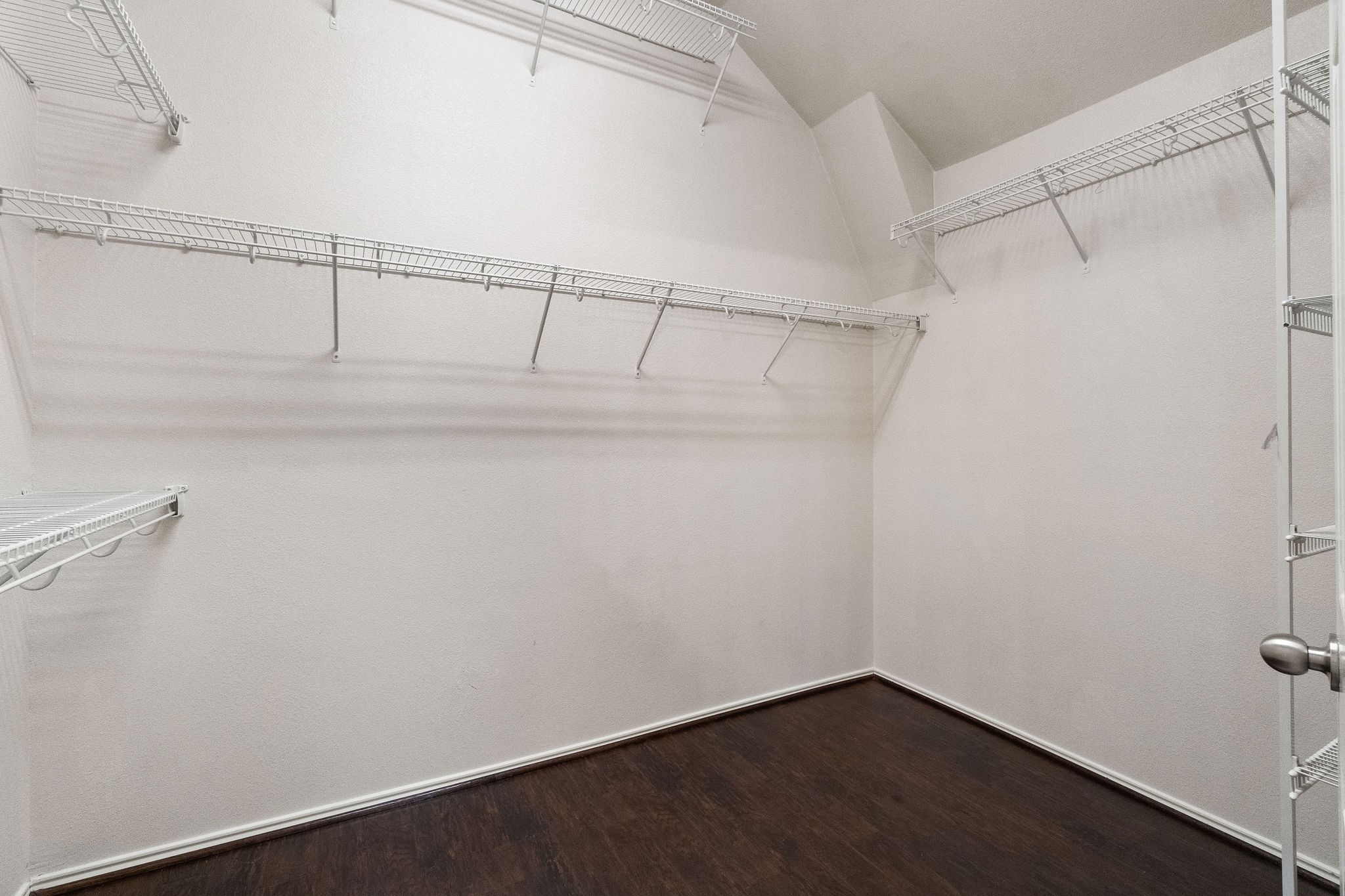 17423 Renee Springs Court Spring, TX 77379 - Photo 10 of 19 a view of walk in closet with empty racks