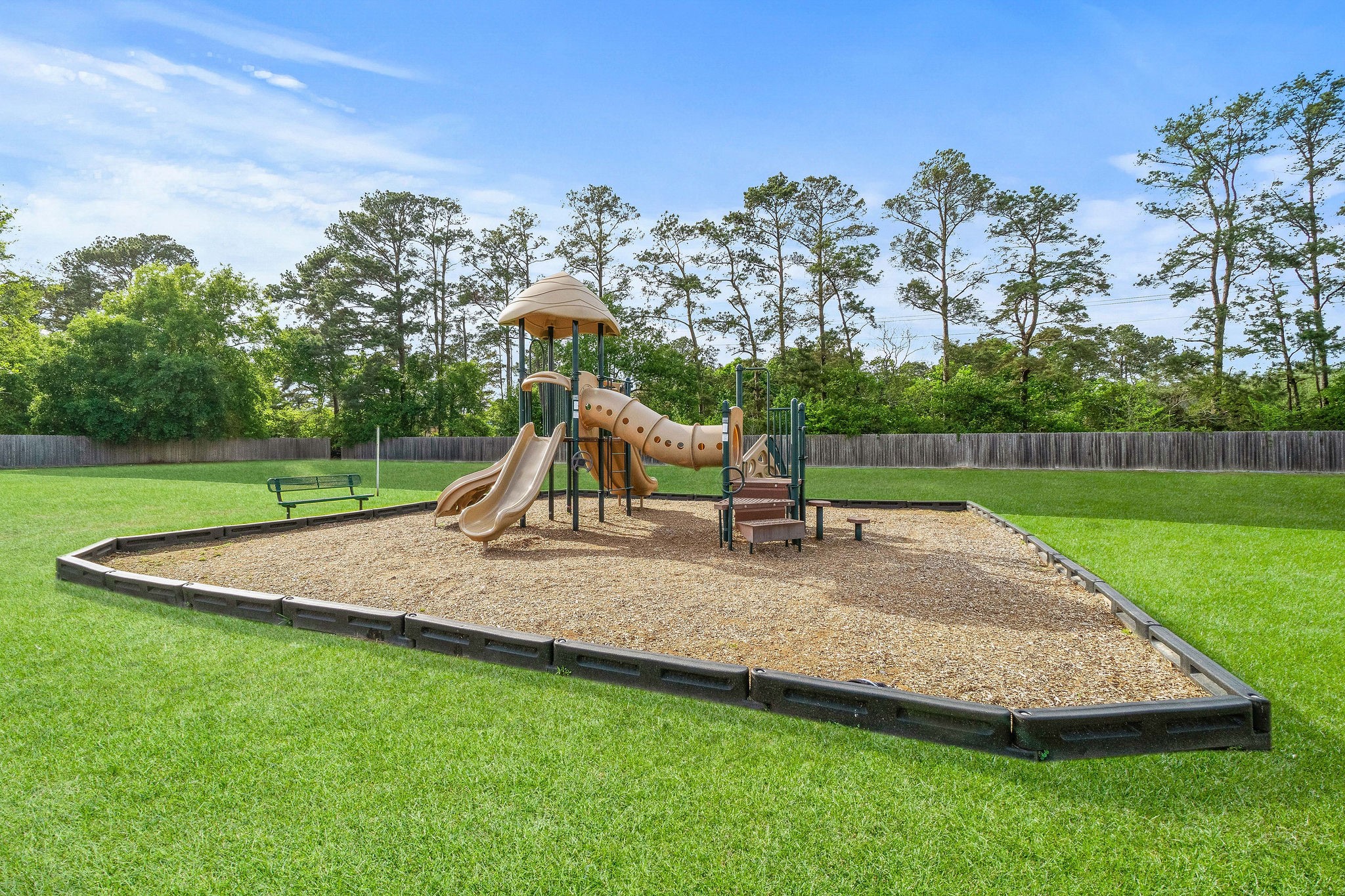 17423 Renee Springs Court Spring, TX 77379 - Photo 16 of 19 a view of outdoor space with playground and green space