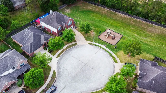 an aerial view of a house having garden space