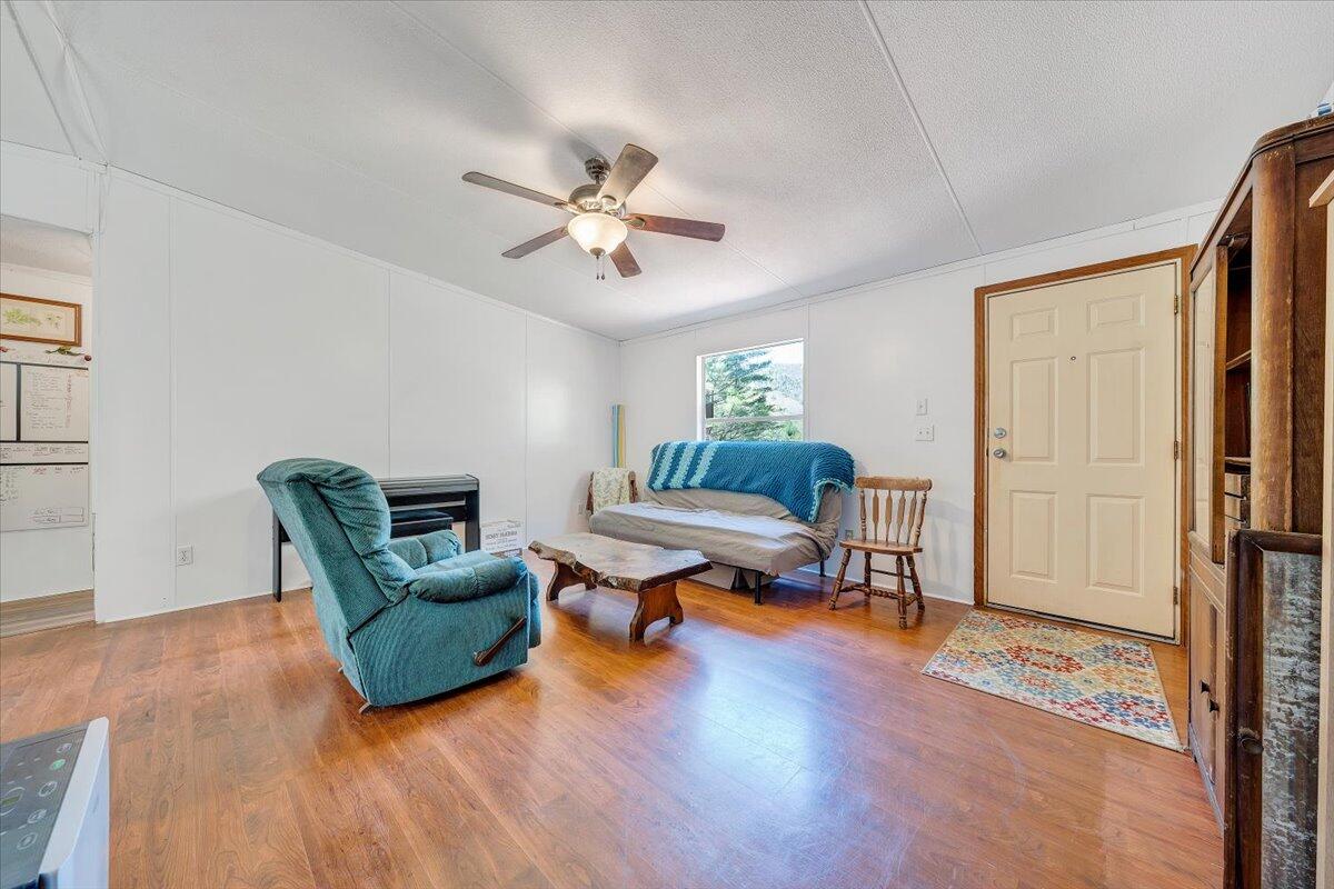 1660 Diamond Knob Road Northeast Check, VA 24072 - Photo 11 of 31 a living room with furniture and a wooden floor