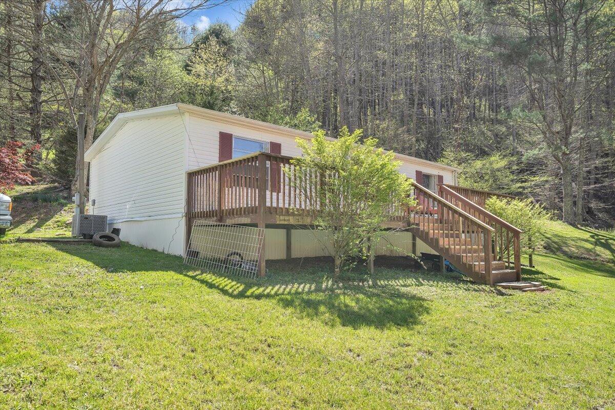 1660 Diamond Knob Road Northeast Check, VA 24072 - Photo 2 of 31 a house view with a garden space