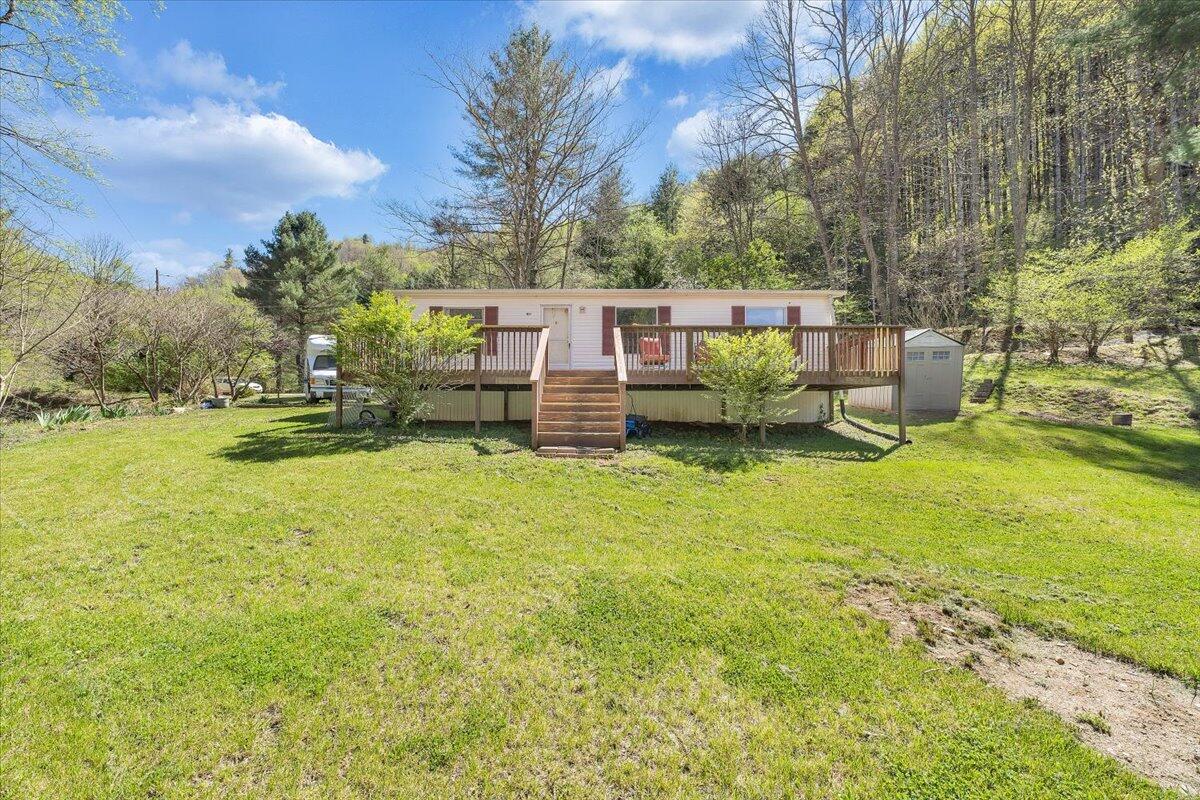 1660 Diamond Knob Road Northeast Check, VA 24072 - Photo 31 of 31 a view of a house with a yard and sitting area