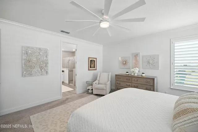 a bathroom with a tub sink shower and mirror
