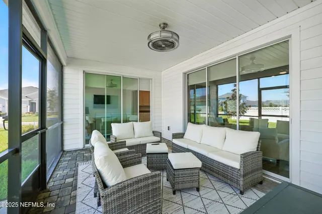 a swimming pool with yard in front of it