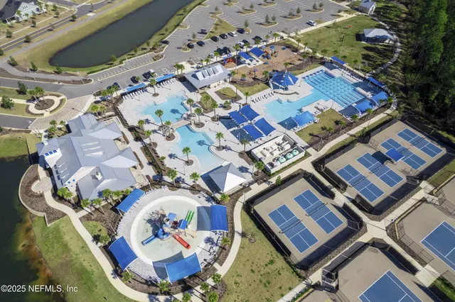 a view of front of a house with a garden