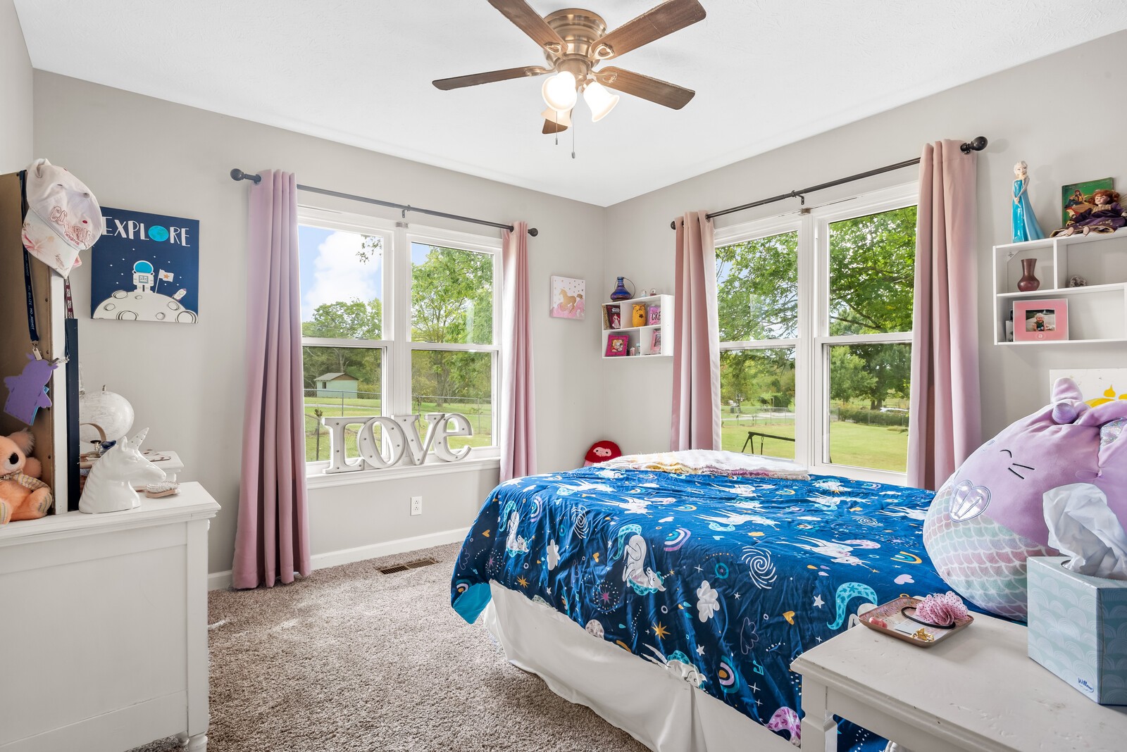 362 Norene Road Lebanon, TN 37090 - Photo 17 of 40 a bed sitting in a bedroom next to a window