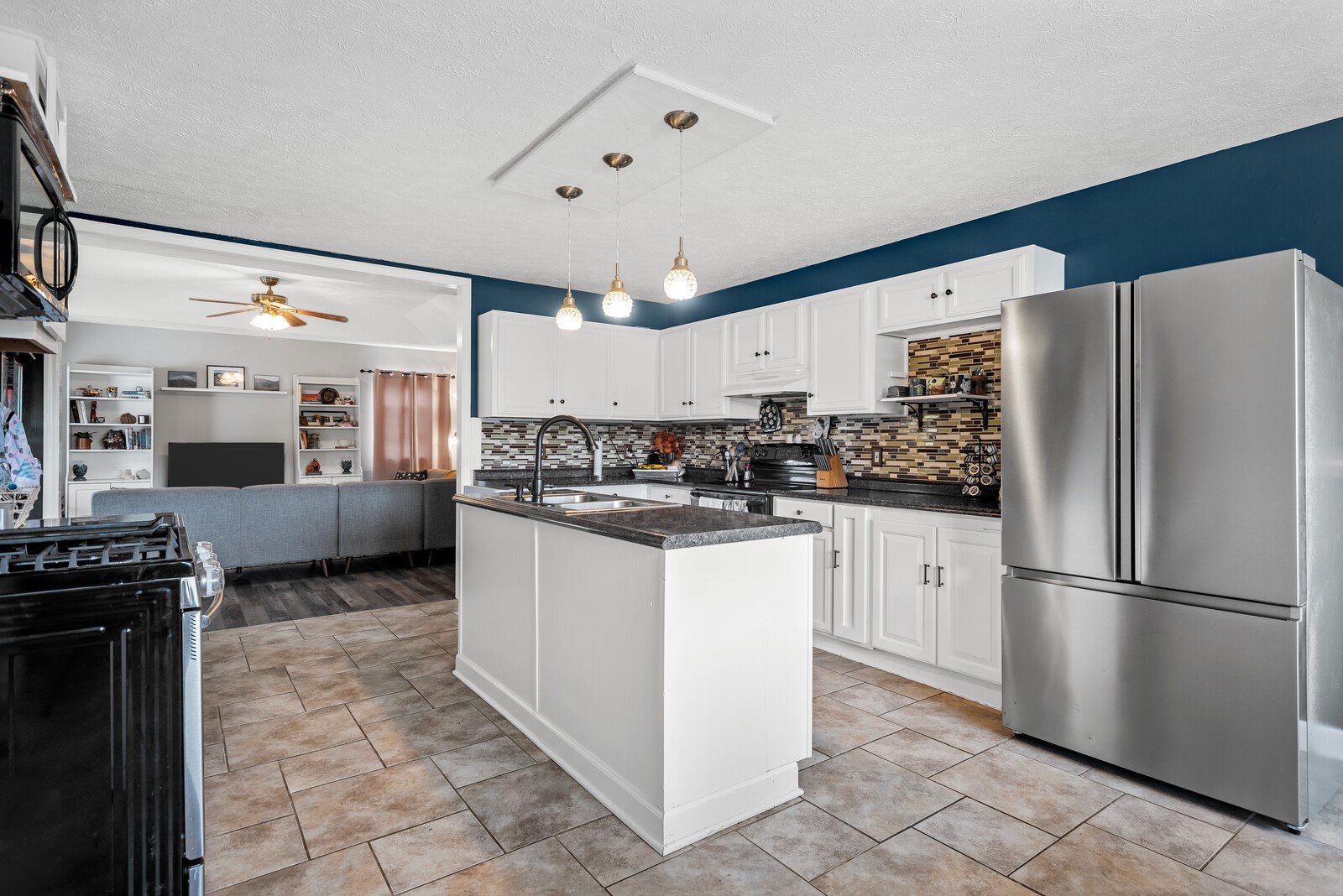 362 Norene Road Lebanon, TN 37090 - Photo 10 of 40 a kitchen with stainless steel appliances a refrigerator sink and cabinets