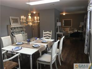 34 Colton Road Edison, NJ 08817 - Photo 4 of 5 a view of a dining room with furniture