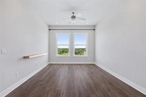 a kitchen with appliances a sink and cabinets