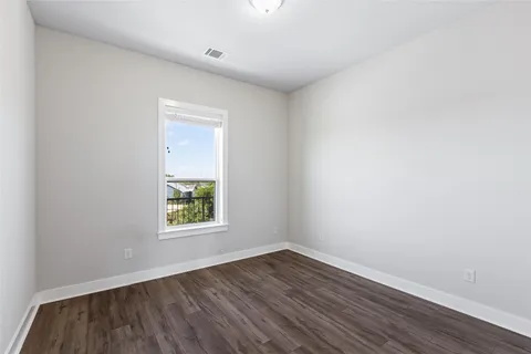 a view of a field with a big yard