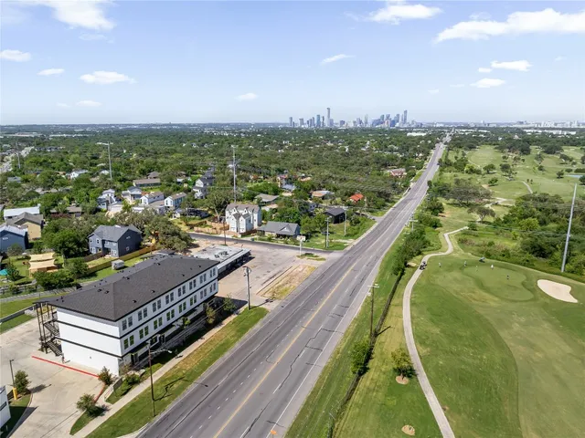 a bathroom with a bathtub and a sink