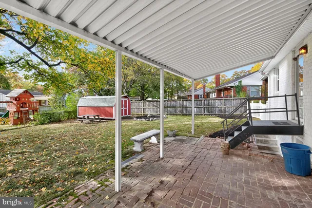 a view of a swimming pool and a yard