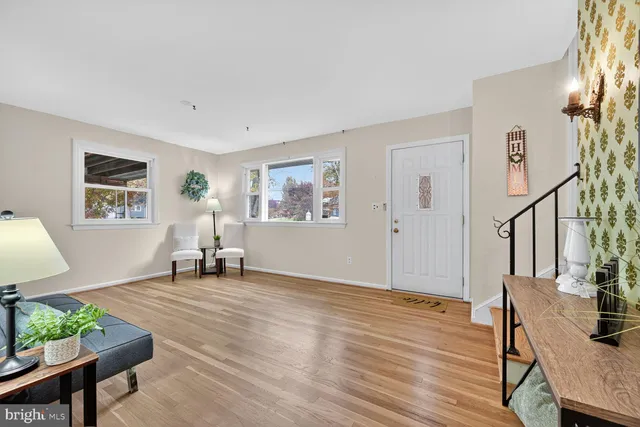 a kitchen with stainless steel appliances granite countertop a stove and a refrigerator
