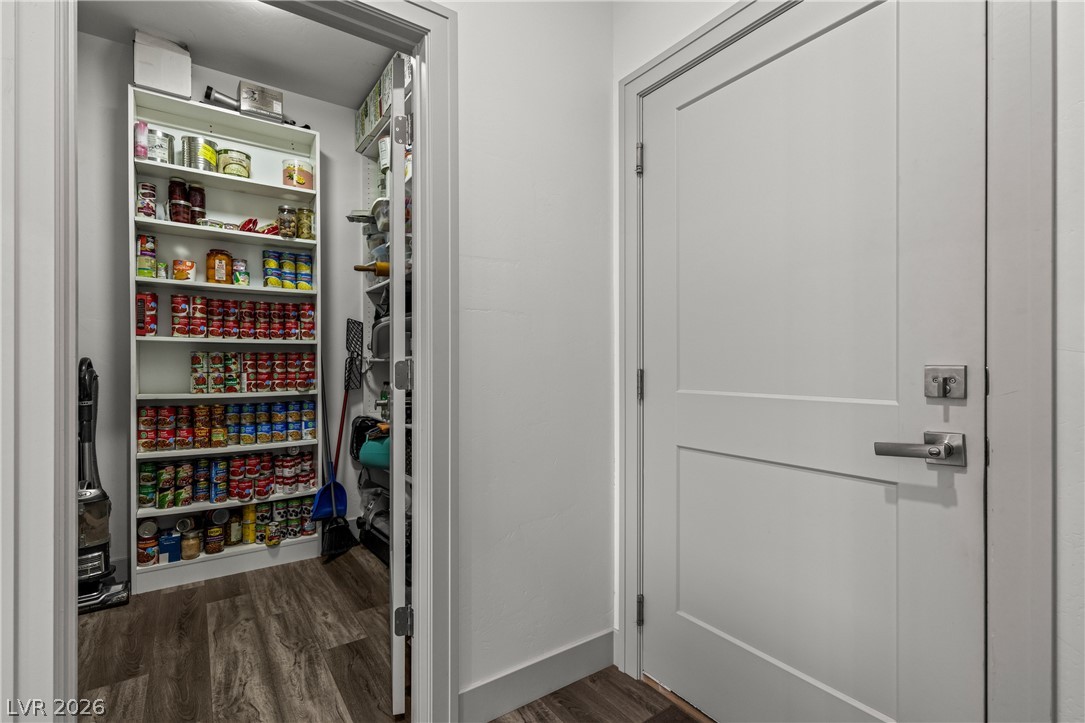3020 Hannig Street Logandale, NV 89021 - Photo 26 of 75 Well-organized pantry features abundant storage shelving and durable flooring.