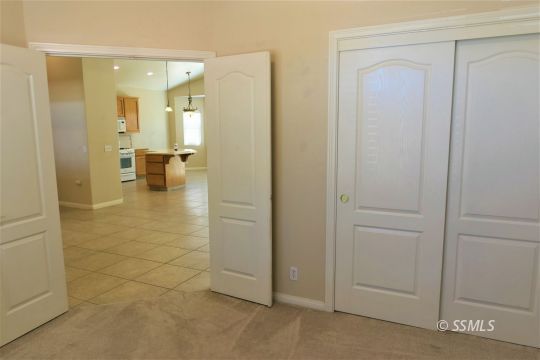 421 Mavis Court Ridgecrest, CA 93555 - Photo 25 of 33 a view of a bathroom with a glass door shower