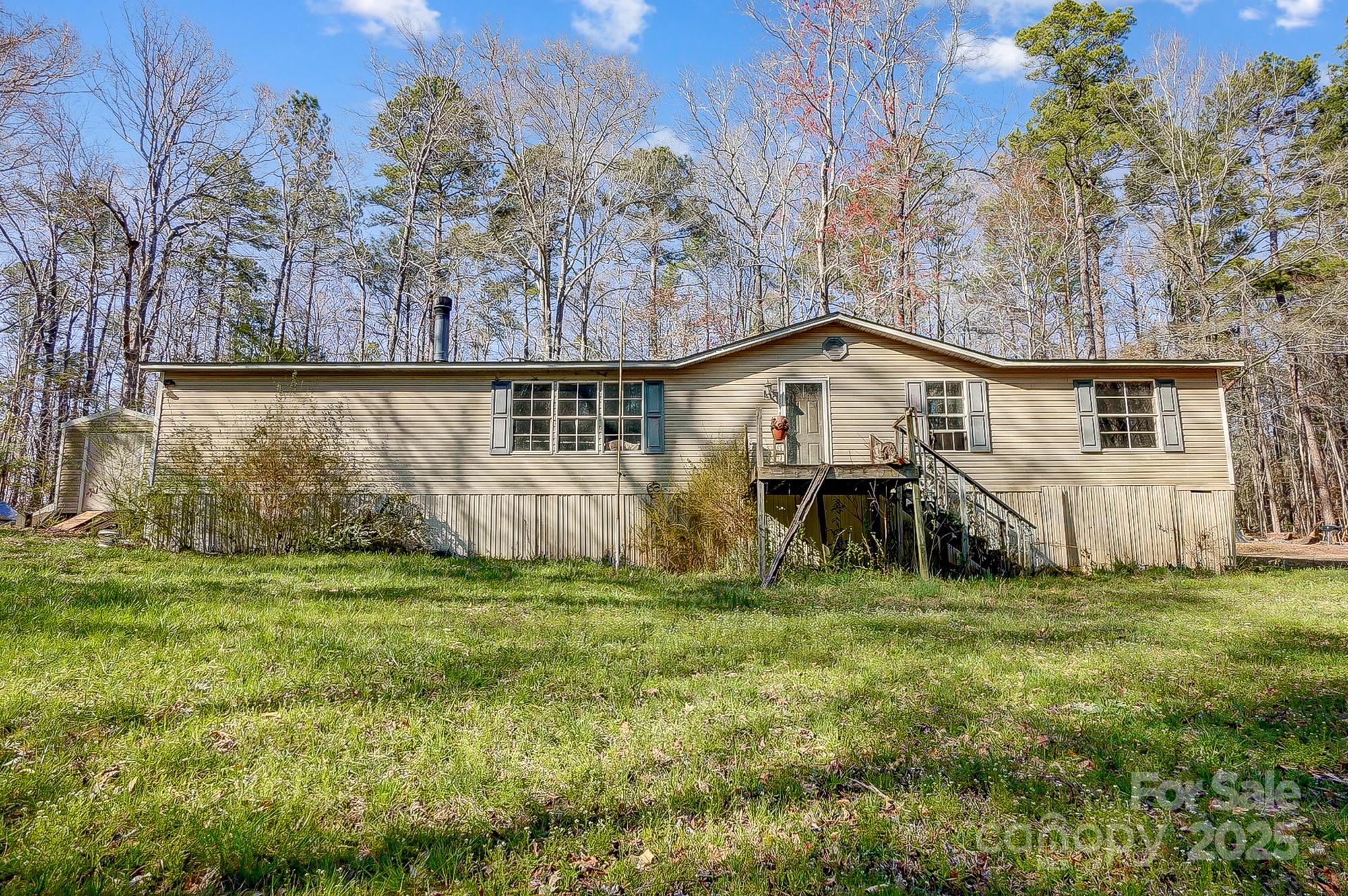 2166 Hough Road Lancaster, SC 29720 - Photo 1 of 23 a view of front of house with a yard