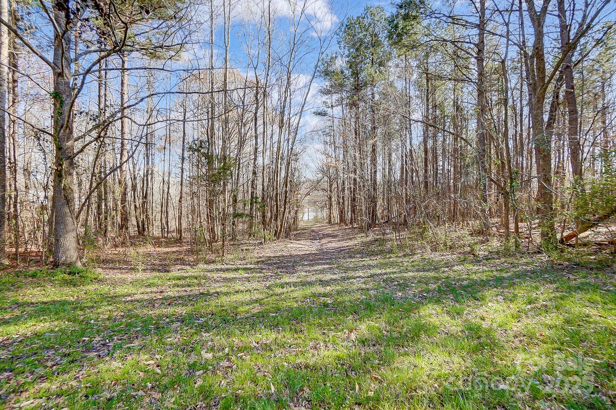 2166 Hough Road Lancaster, SC 29720 - Photo 12 of 23 a view of a backyard with white fence
