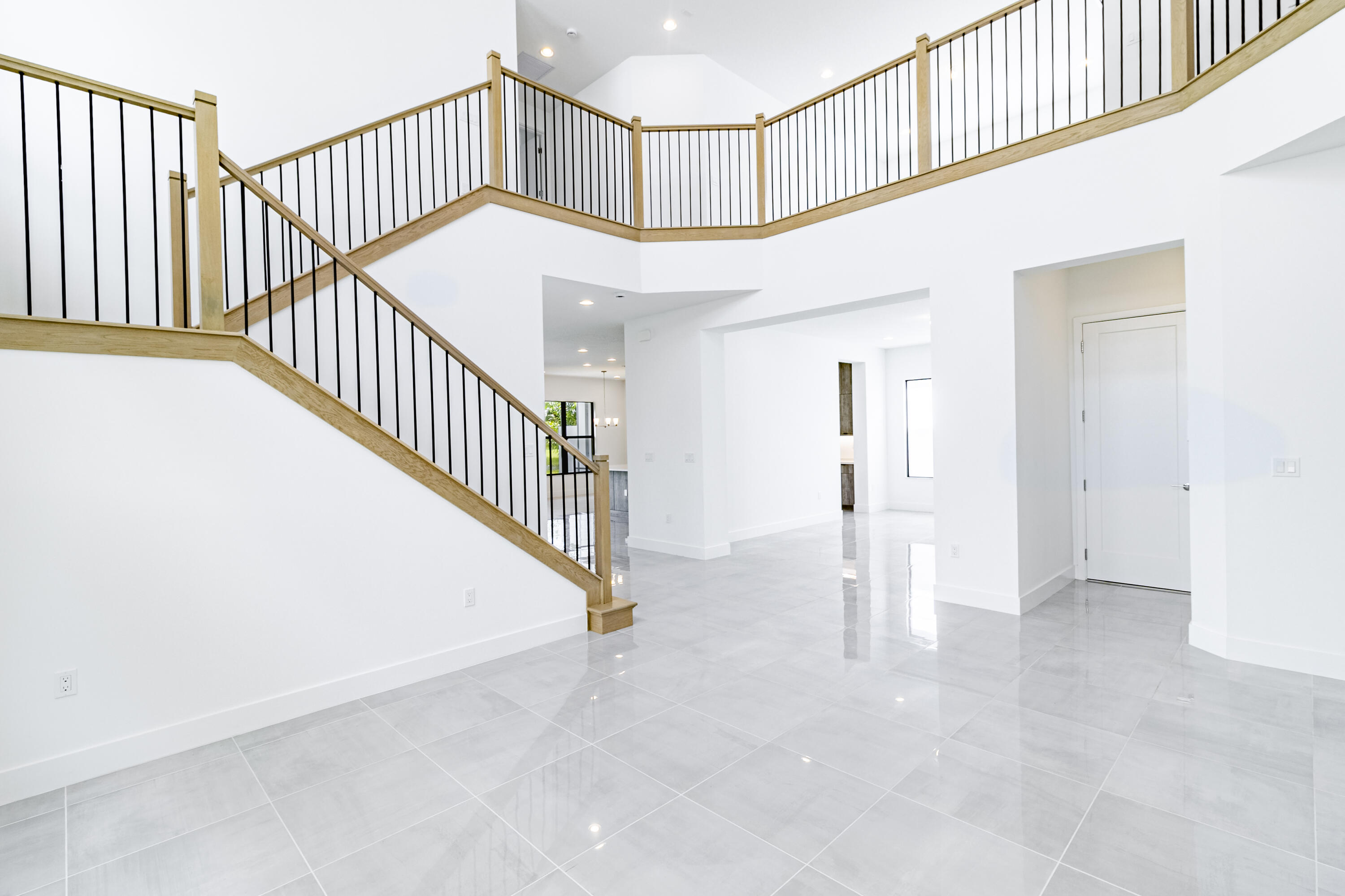 20302 Somerset Hls Drive Boca Raton, FL 33434 - Photo 12 of 111 a view of staircase with white walls and a window