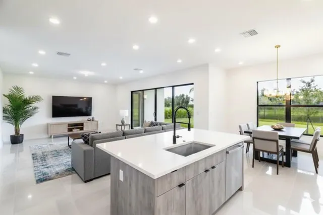 a bathroom with a toilet a sink and a mirror