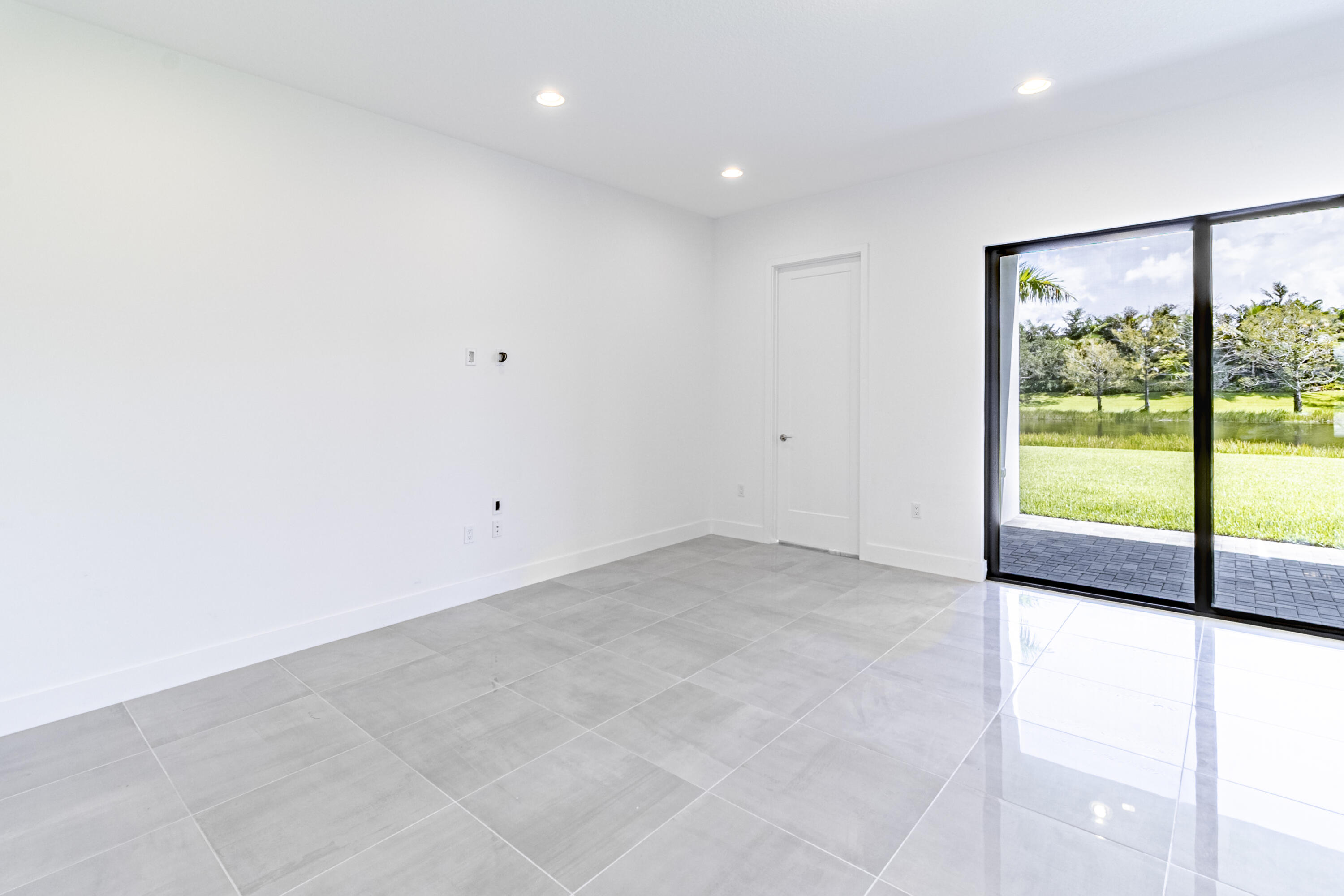 20302 Somerset Hls Drive Boca Raton, FL 33434 - Photo 25 of 111 a view of an empty room with a window