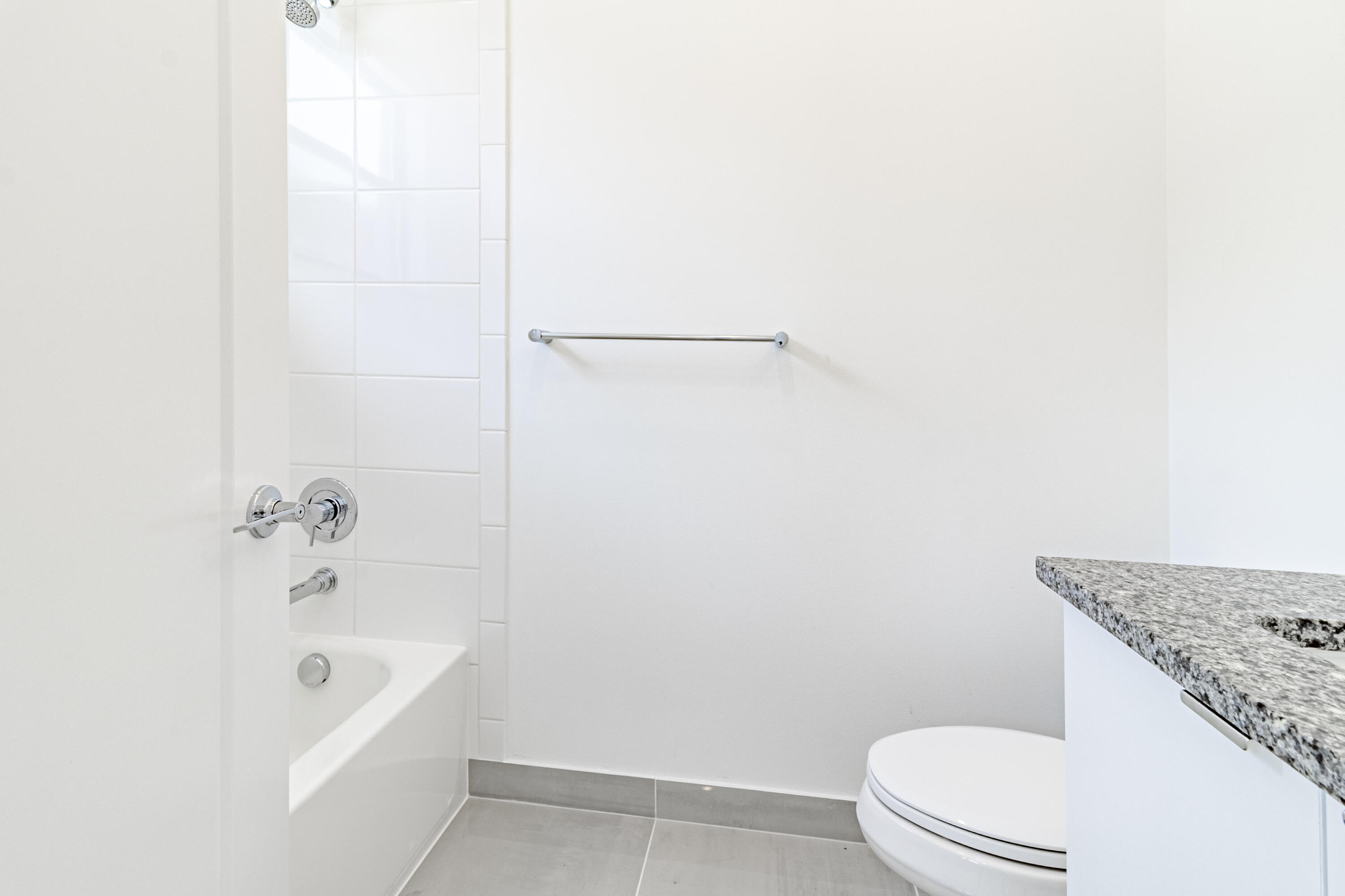 20302 Somerset Hls Drive Boca Raton, FL 33434 - Photo 42 of 111 a bathroom with a granite countertop bathtub shower and toilet