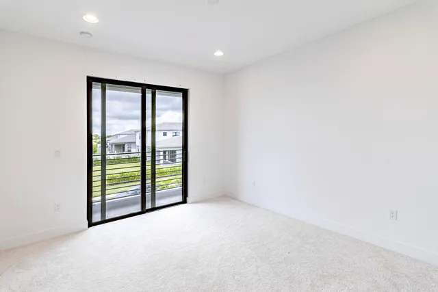 a view of yard with swimming pool and green space
