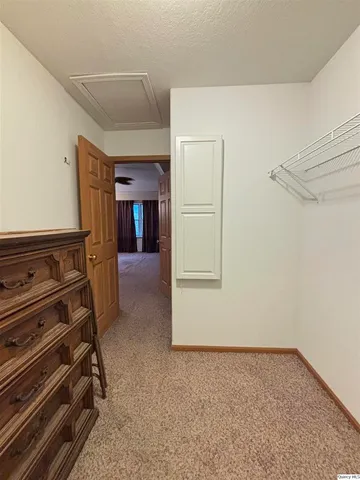 a view of a room with racks on the wall