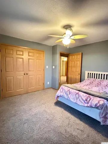 a spacious bathroom with a sink and a mirror