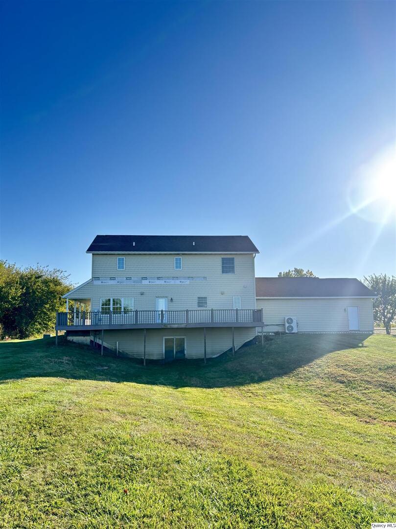 1848 North Co Road 1700 Carthage, IL 62321 - Photo 31 of 33 a view of a large pool with a yard