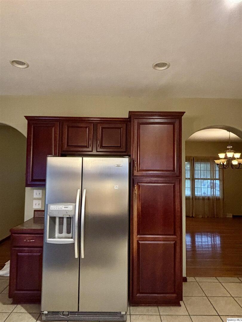 1848 North Co Road 1700 Carthage, IL 62321 - Photo 10 of 33 a kitchen with stainless steel appliances granite countertop a refrigerator and a sink