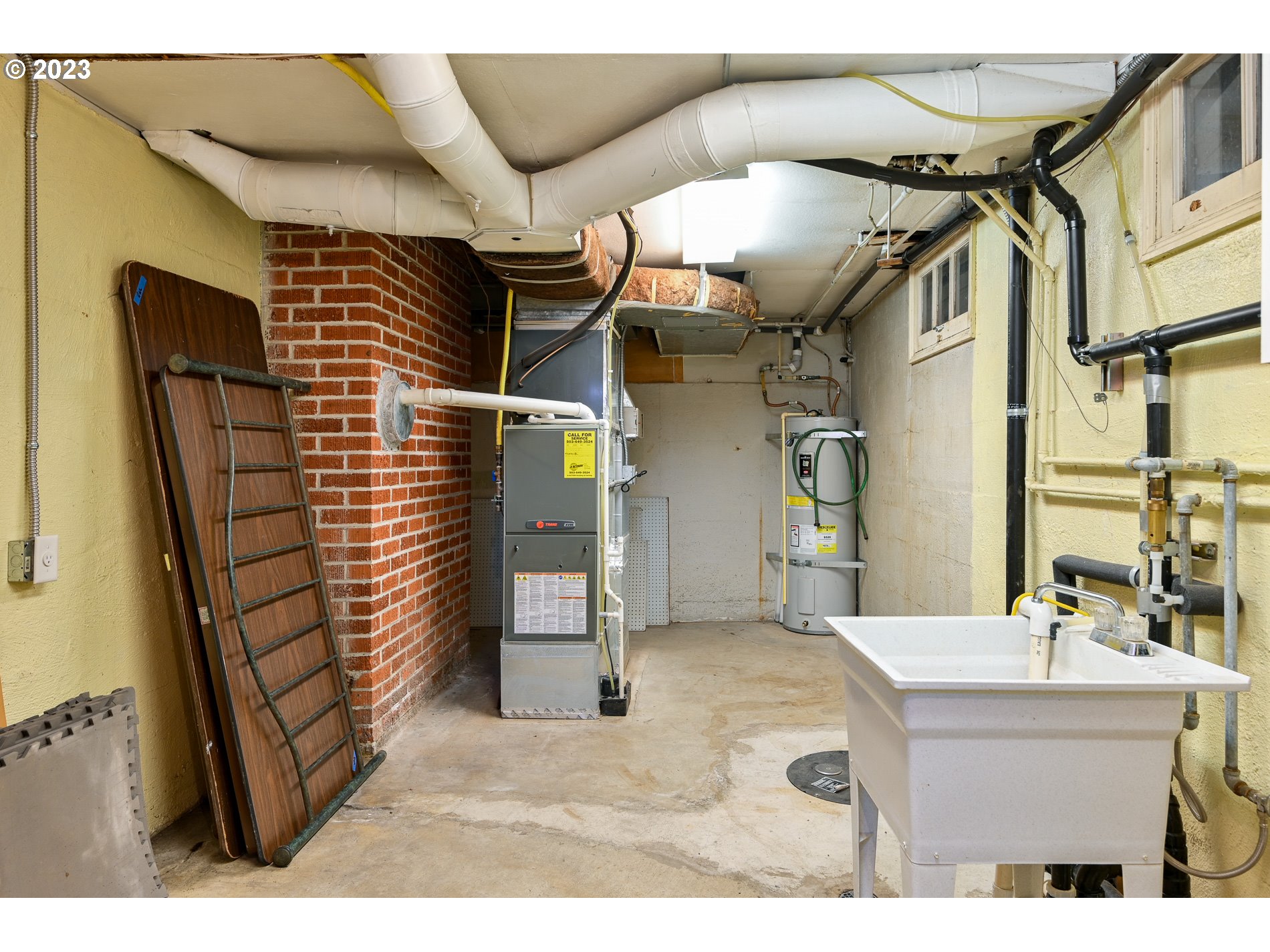 8201 Southwest 41st Avenue Portland, OR 97219 - Photo 15 of 23 a bathroom with a sink and a mirror