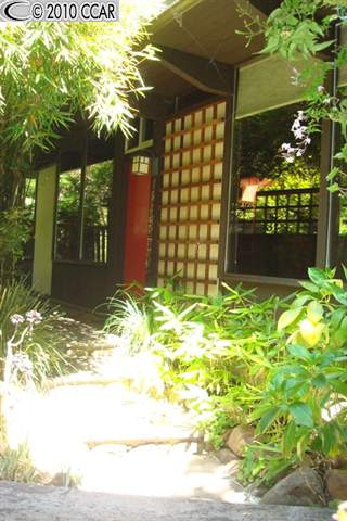 5 Oak Street Path Berkeley, CA 94708 - Photo 1 of 1 a view of yellow house with a yard