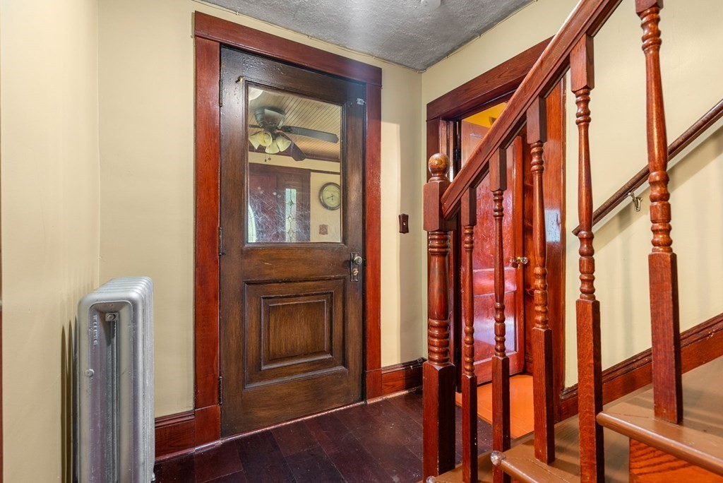 65 NW Road Westfield, MA 01085 - Photo 11 of 29 a view of front door with stairs