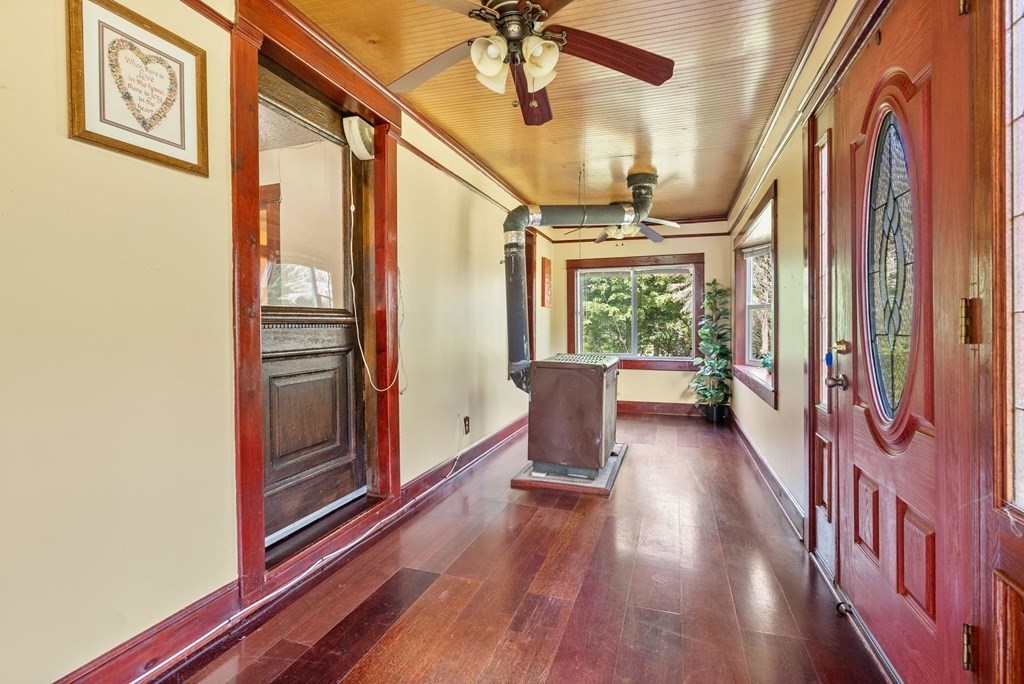65 NW Road Westfield, MA 01085 - Photo 13 of 29 a view of an entryway with wooden floor and door