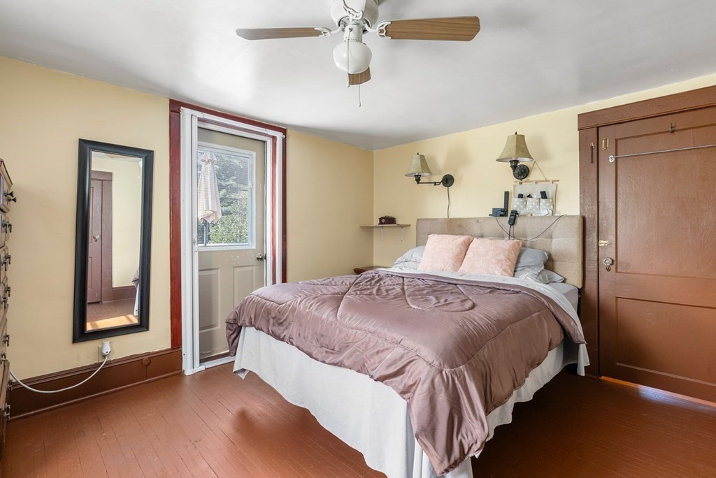 65 NW Road Westfield, MA 01085 - Photo 16 of 29 a bedroom with a bed and a window