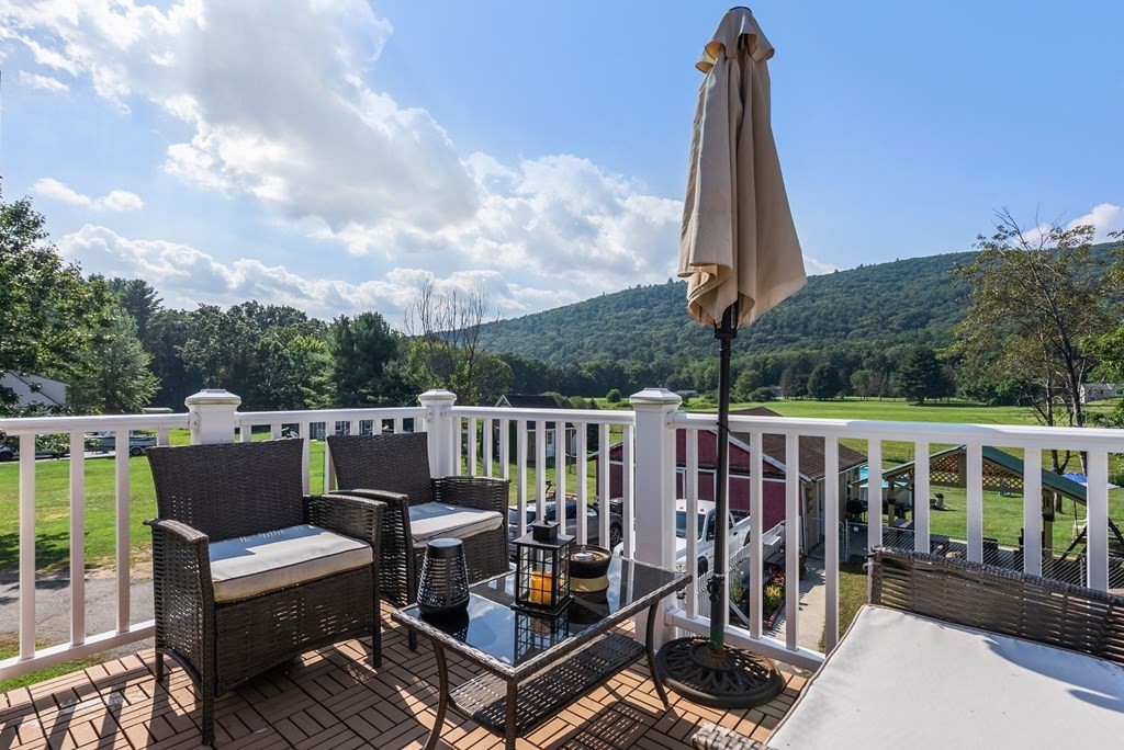 65 NW Road Westfield, MA 01085 - Photo 17 of 29 a view of a deck with furniture