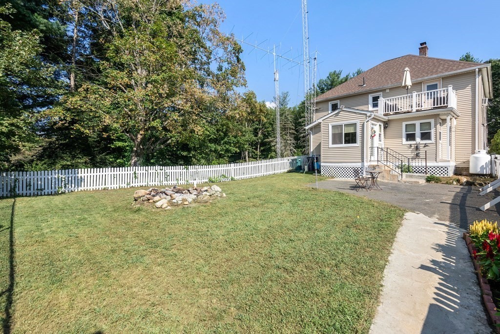 65 NW Road Westfield, MA 01085 - Photo 23 of 29 a swimming pool view with a outdoor seating