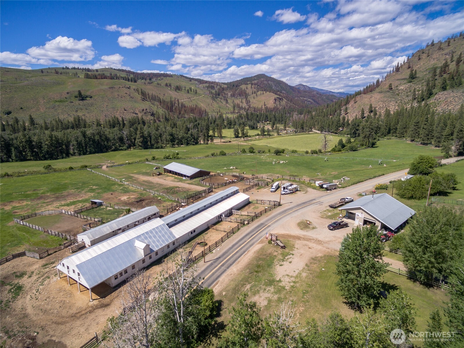 579 Eastside Chewuch Road Winthrop, WA 98862 - Photo 2 of 37 an aerial view of a house with outdoor space and street view