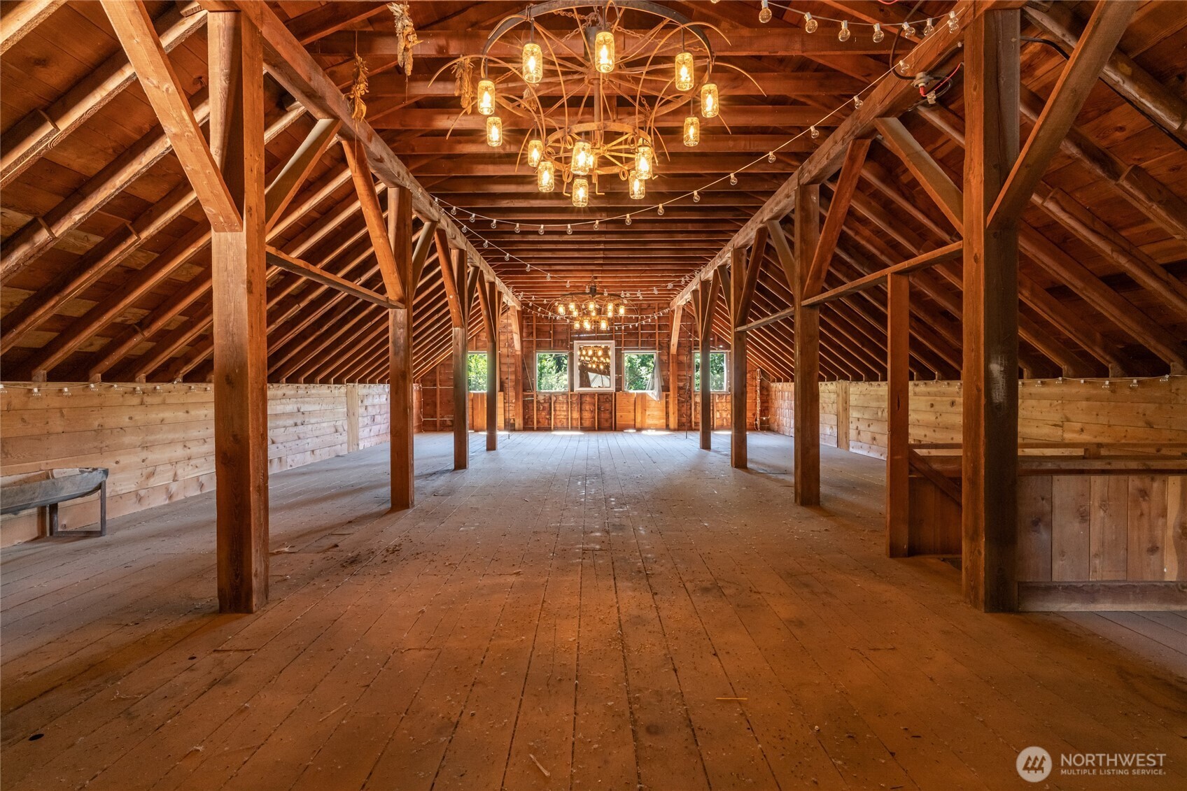 579 Eastside Chewuch Road Winthrop, WA 98862 - Photo 24 of 37 a view of an empty room with wooden floor