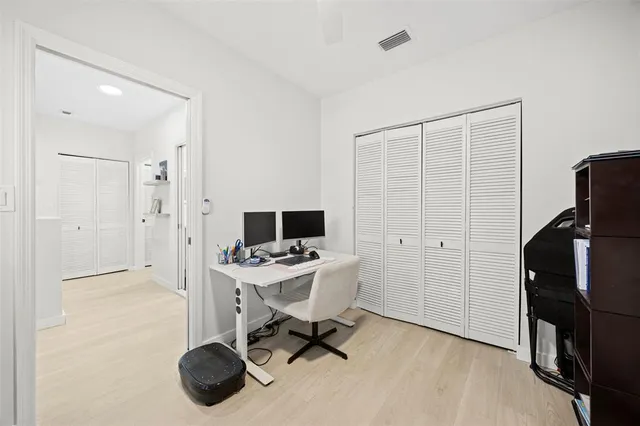 a view of a workspace with furniture and toys