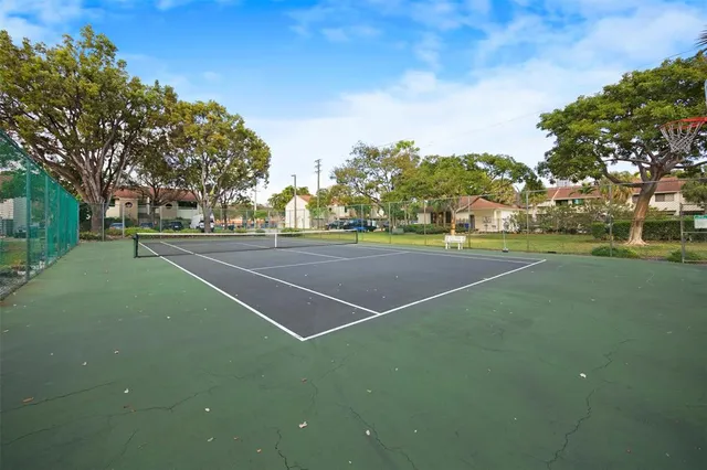 a view of a house with a flower garden