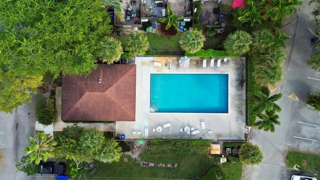 a view of a city and yard and tall buildings