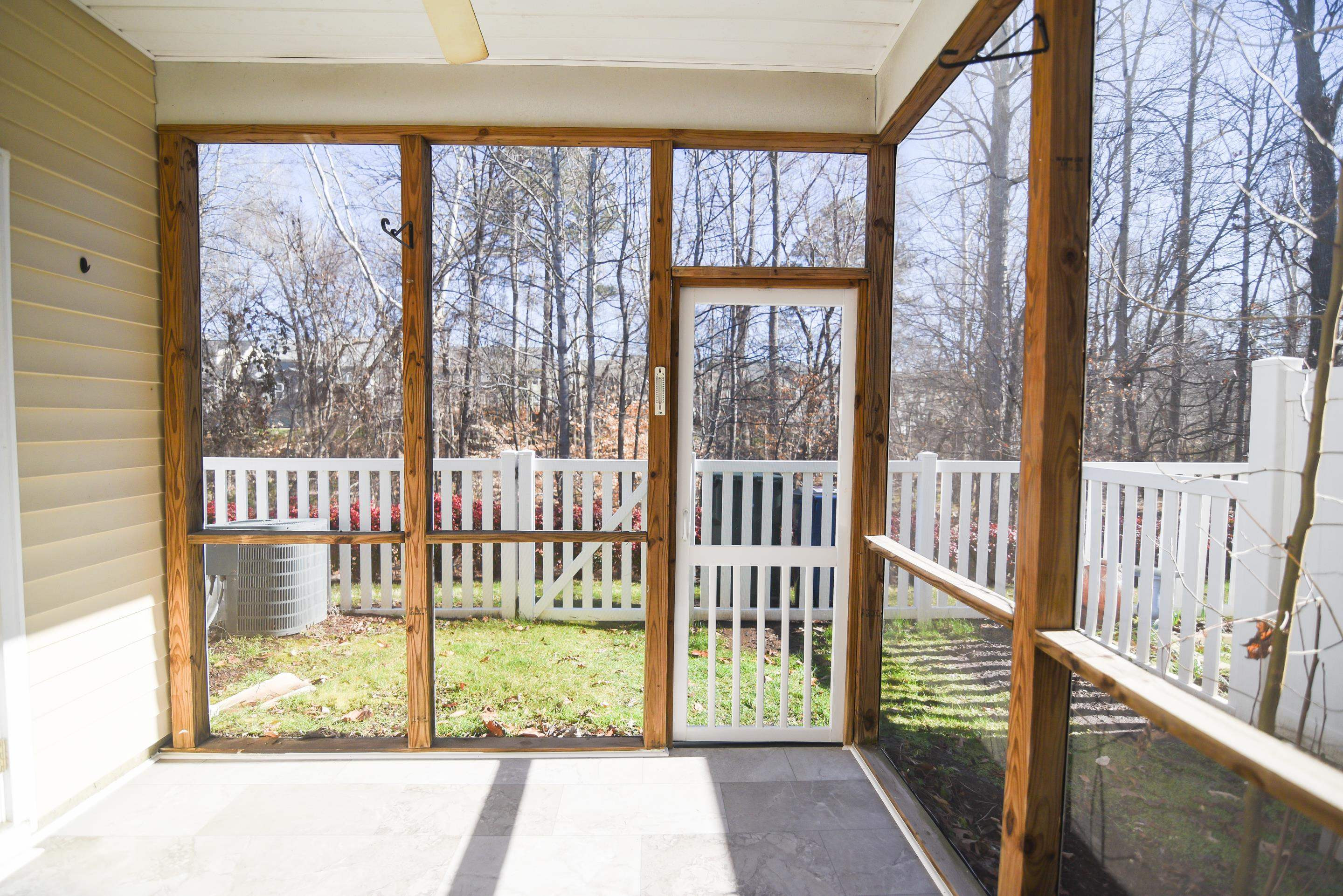 11255 Lofty Heights Place Raleigh, NC 27614 - Photo 13 of 19 Indoor living continues outdoors! Perfect spot to enjoy the sites and sounds of nature! Screened Porch