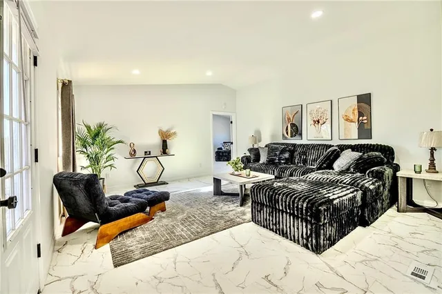 a living room with a couch and furniture