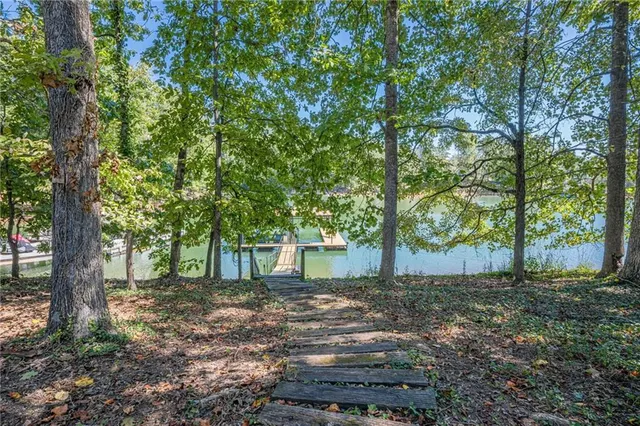 a backyard of a house with lots of green space