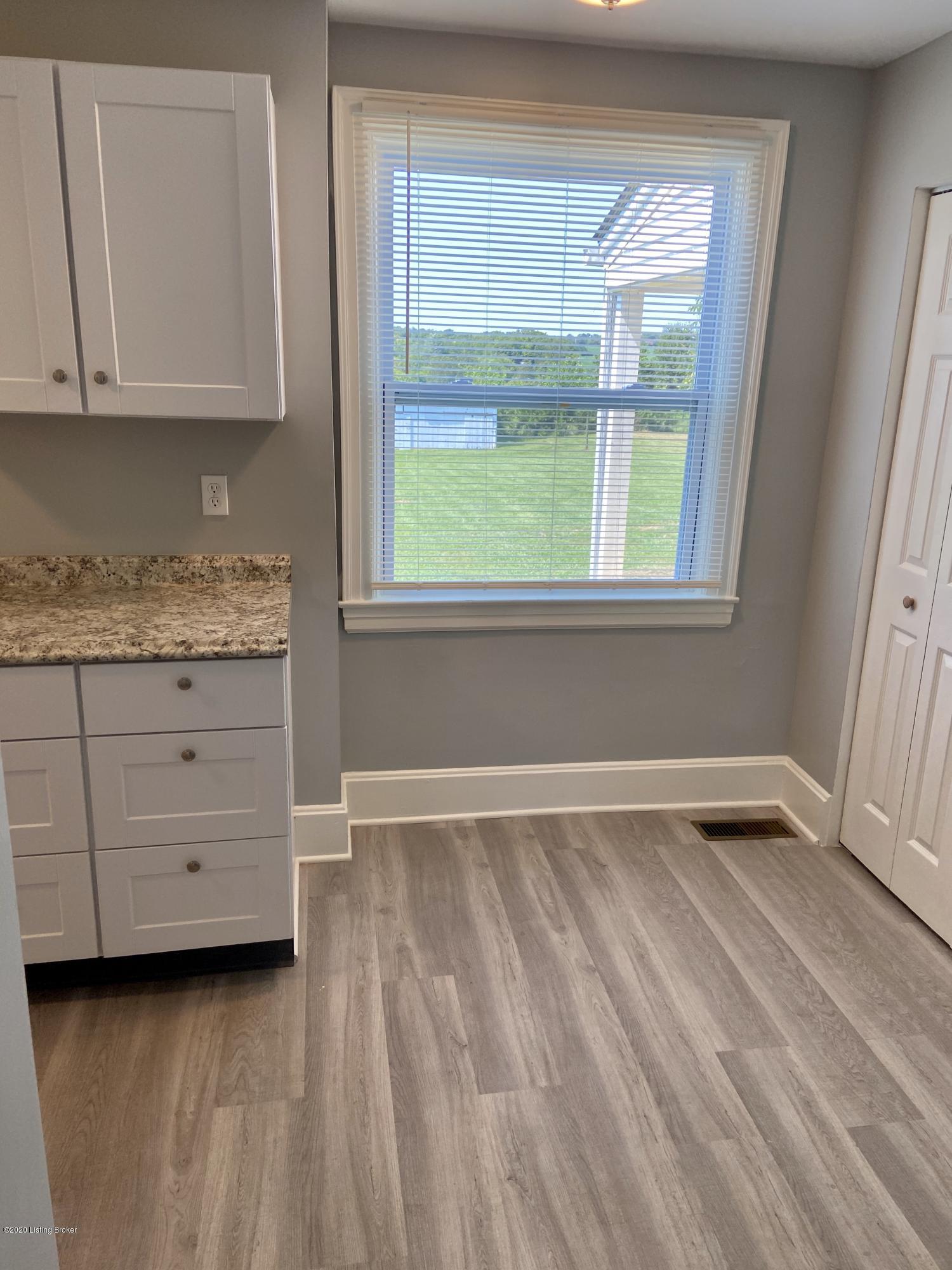 129 Spring Street New Castle, KY 40050 - Photo 19 of 53 NEW flooring in Kitchen